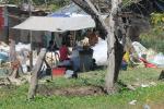 Small shacks near the river