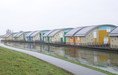 Land view of the floating houses in Maasbommel