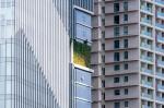 Small portion of a green facade some 20 floors up