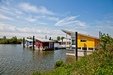 Floating houses in OhÃ© en Laak