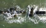 Top view of the breakwater, breaking a wave