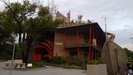 sustainable building in Tainan with permeable pavement, sun collectors, wind energy, constructed wetland etc