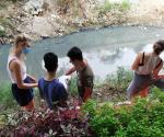 The team measuring stream flow.