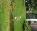 entreance of gutter from school to swale