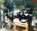 People along the Mactan st. selling food