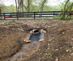 Swale after first new use with overflow to the two vertical infiltration pipes - credit Antal Zuurman