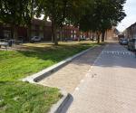 Bestrating op één oor, band met openingen, wadi Kamgarenplein Tilburg